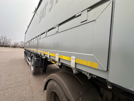 Самосвальный полуприцеп CАТ 510 55 м3 алюминиевый 4 оси с задней и боковой разгрузкой детальное фото - Spec-Trucks