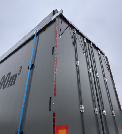 Полуприцеп мусоровоз с подвижным полом САТ 150 90 м3 детальное фото - Spec-Trucks