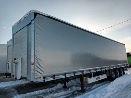 Шторный полуприцеп FLIEGL SDS 350 с кониками детальное фото - Spec-Trucks